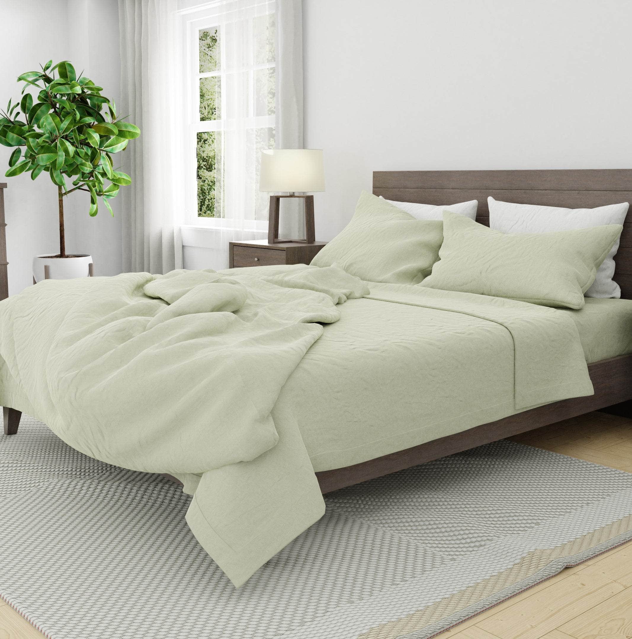 Bed featuring Linen Pillowcases in White with Linen Sheet Set and Duvet Cover in Seafoam