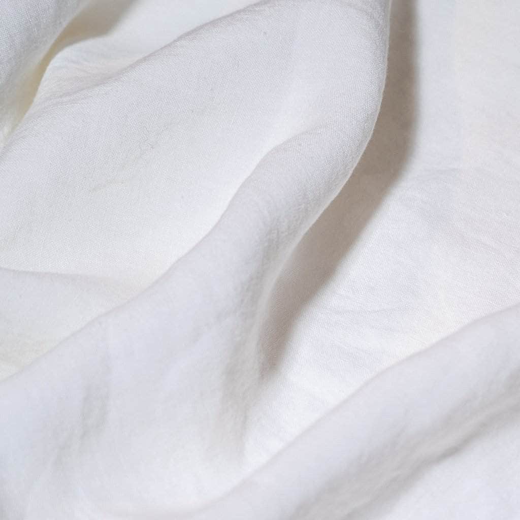 close up of white linen sheets