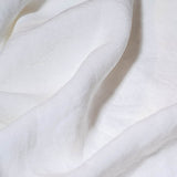 close up of white linen sheets