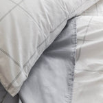 Bed featuring the Organic Percale Pillowcases in Light Grey Frame