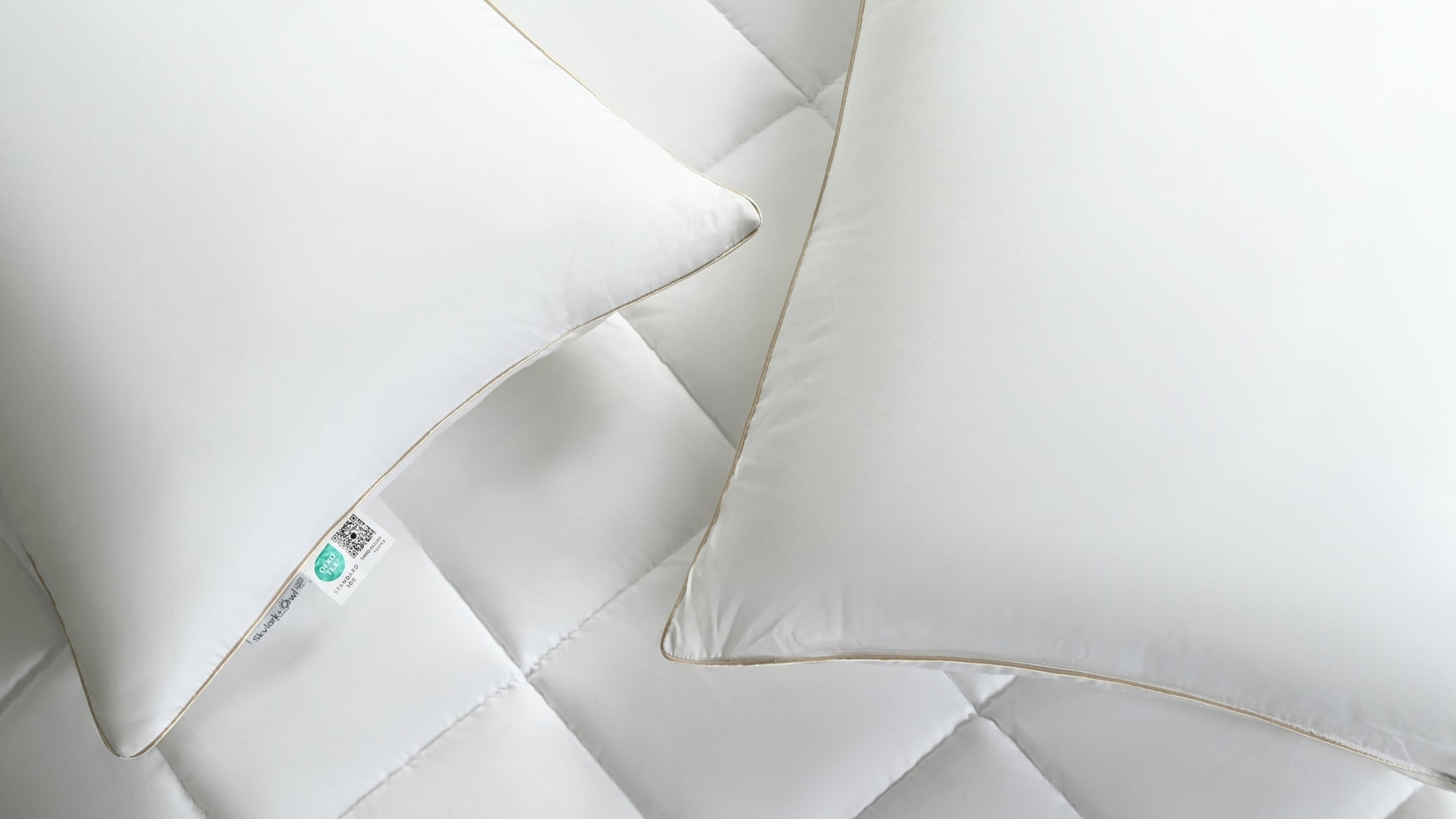 A close-up of a Skylark+Owl Bamboo Pillow, featuring a luxurious 300-thread-count bamboo shell and a soft, plush design.