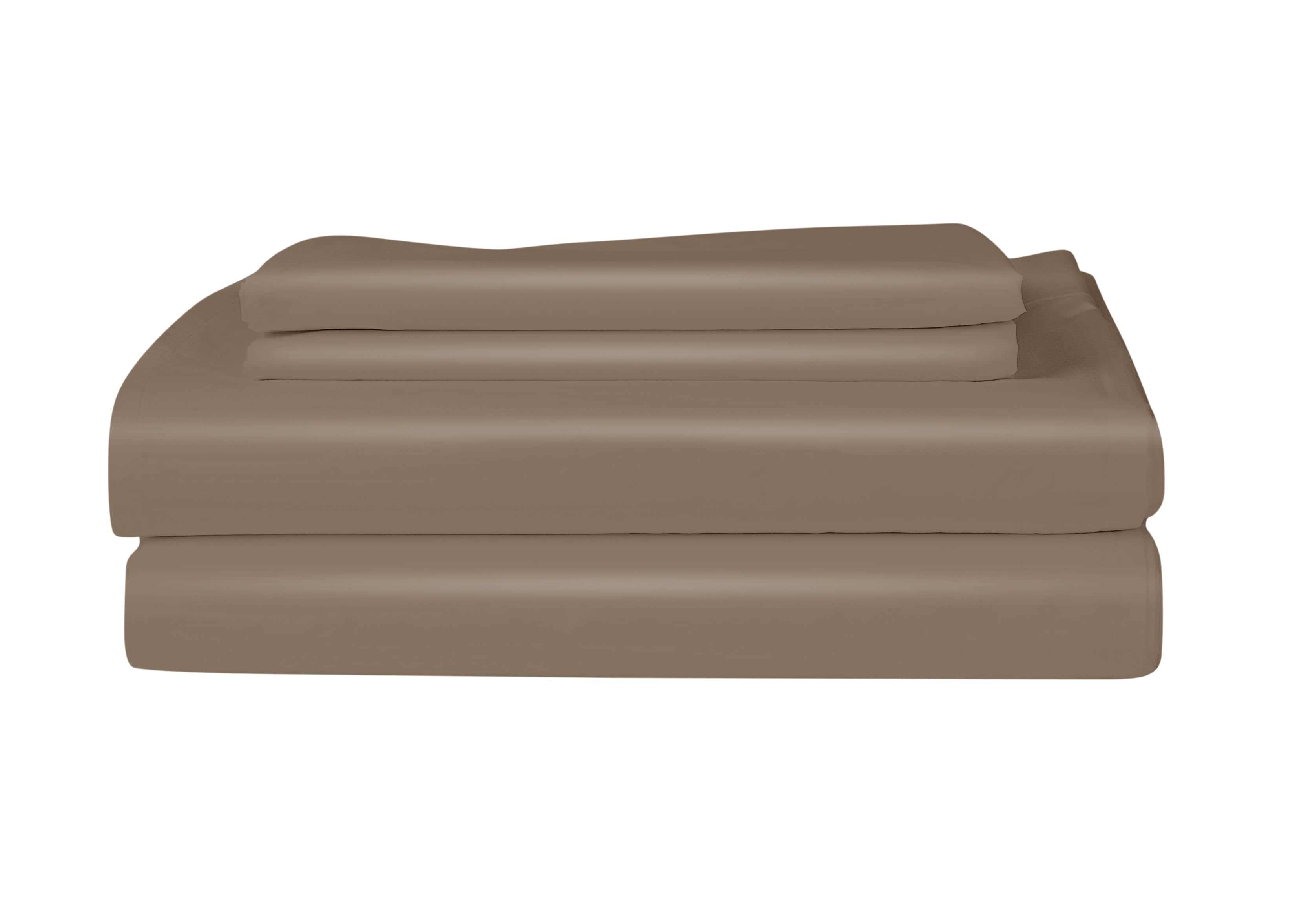 Folded brown bed sheets on a white background