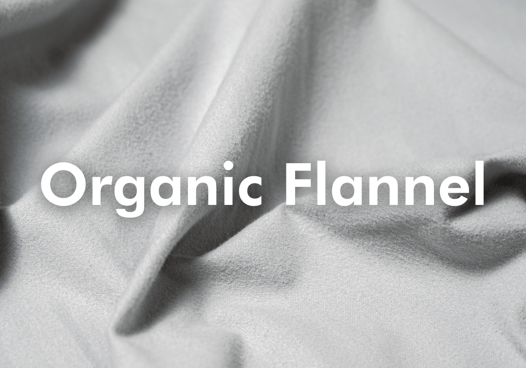 Close-up of organic flannel fabric with the text 'Organic Flannel' displayed.