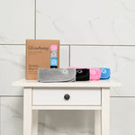 GlowAway product set on a white surface with a tiled wall background