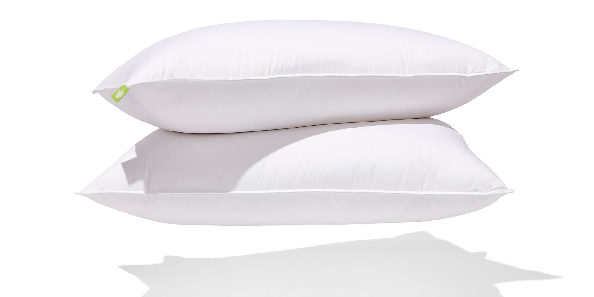 Two stacked Hutterite white down pillows