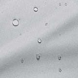 Close-up image of Cooling Mattress Protector fabric with water droplets on top demonstrating its moisture-wicking properties