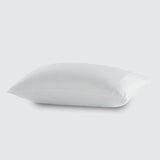 Image of a white pillow protector (on a pillow) on a white background