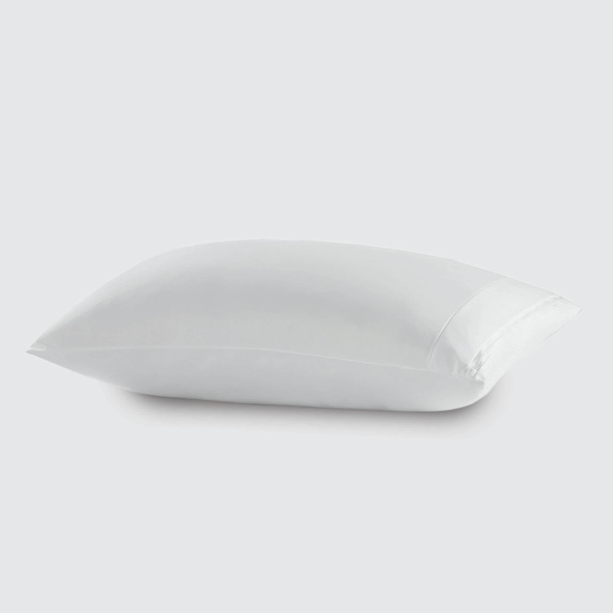 Image of a white pillow protector (on a pillow) on a white background