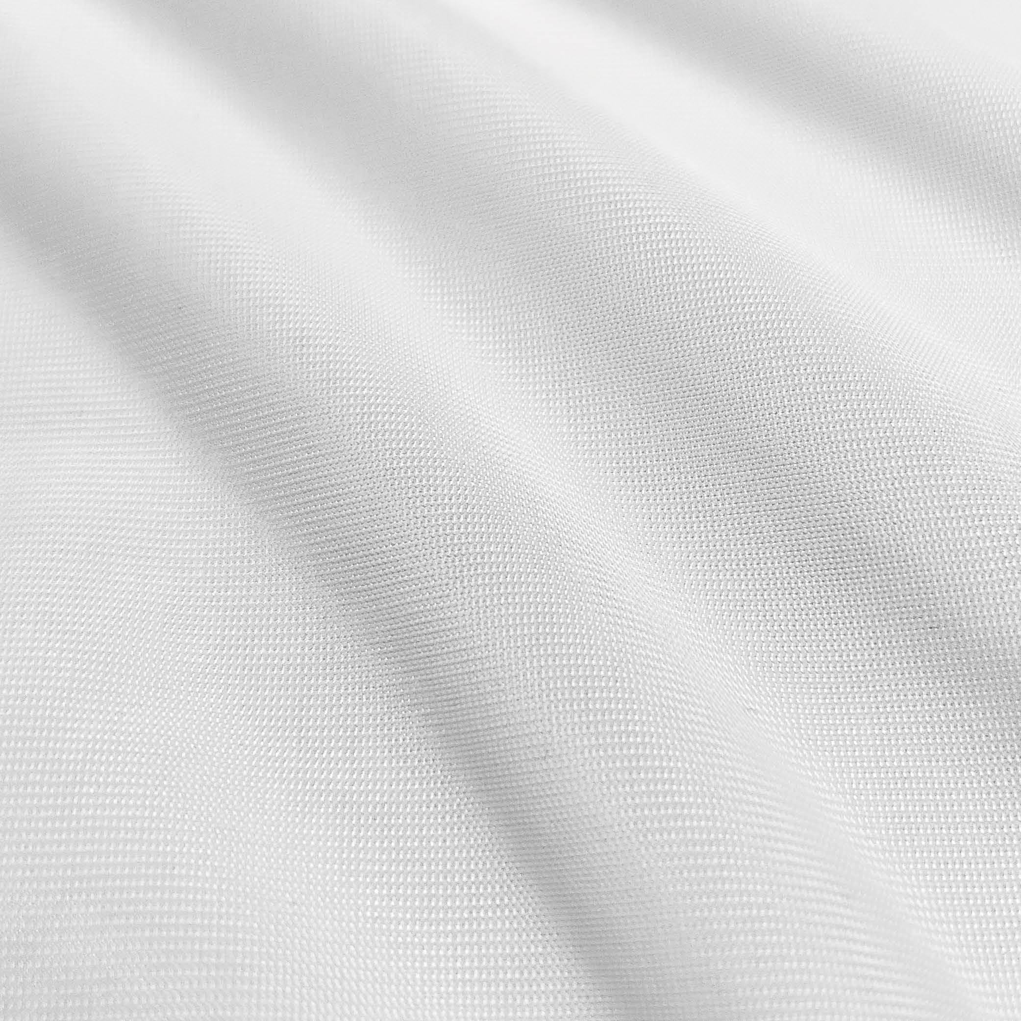 Close-up image of white mattress protector fabric