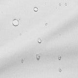 Close-up image of water droplets on a mattress protector