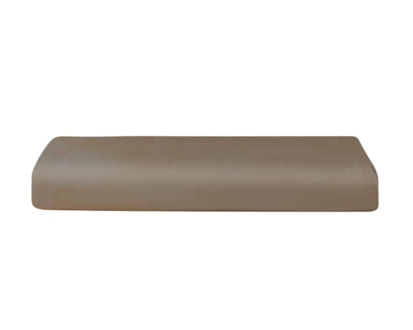 Rectangular beige object on a white background