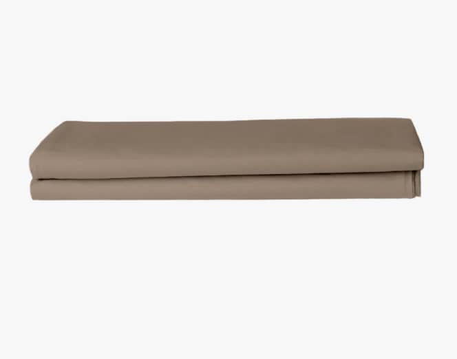 Folded Simply Taupe fabric on a white background