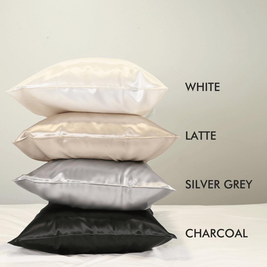 4 pillows in 4 different colours (White, Latte, Silver Grey, and Charcoal) stacked on top of each other  | Skylark+Owl Linen Co.