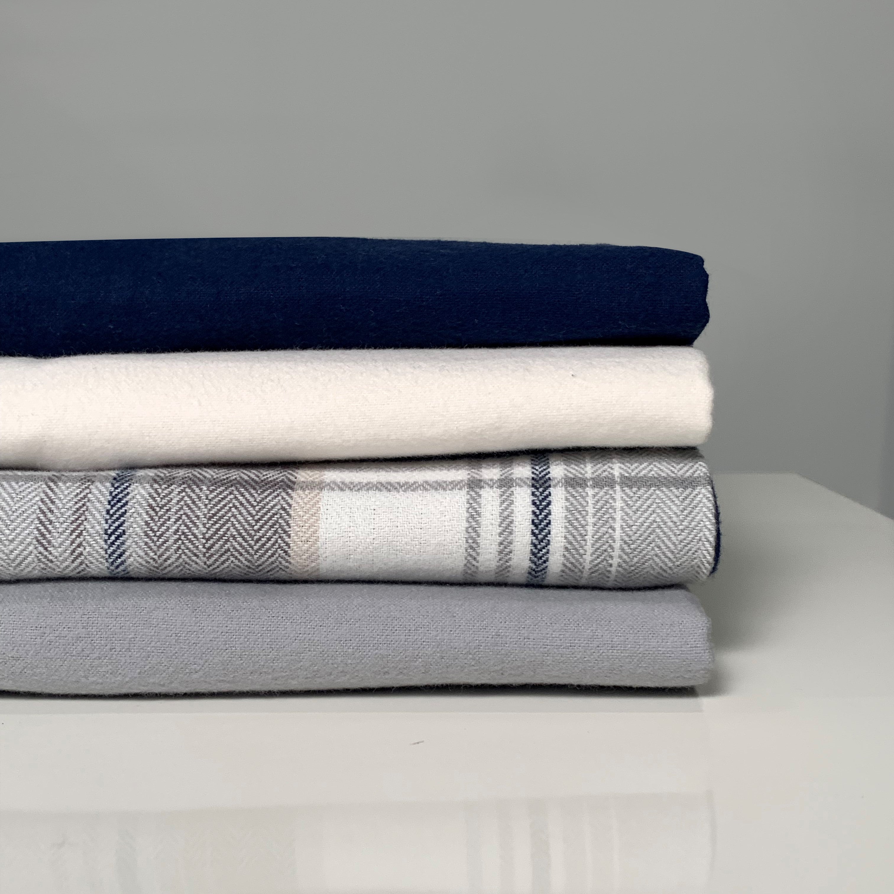 organic cotton sheets stacked