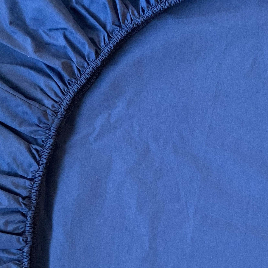 Close up of Essential Collection Percale Fitted Sheet in Navy