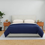 Bed with Essential Collection Percale Sheet Set in Dune and Essential Collection Percale Duvet Cover in Navy