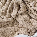 Close up of Linen coloured cable knit blanket 
