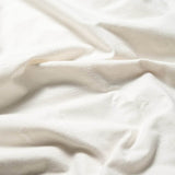 Close up organic flannel sheets cream
