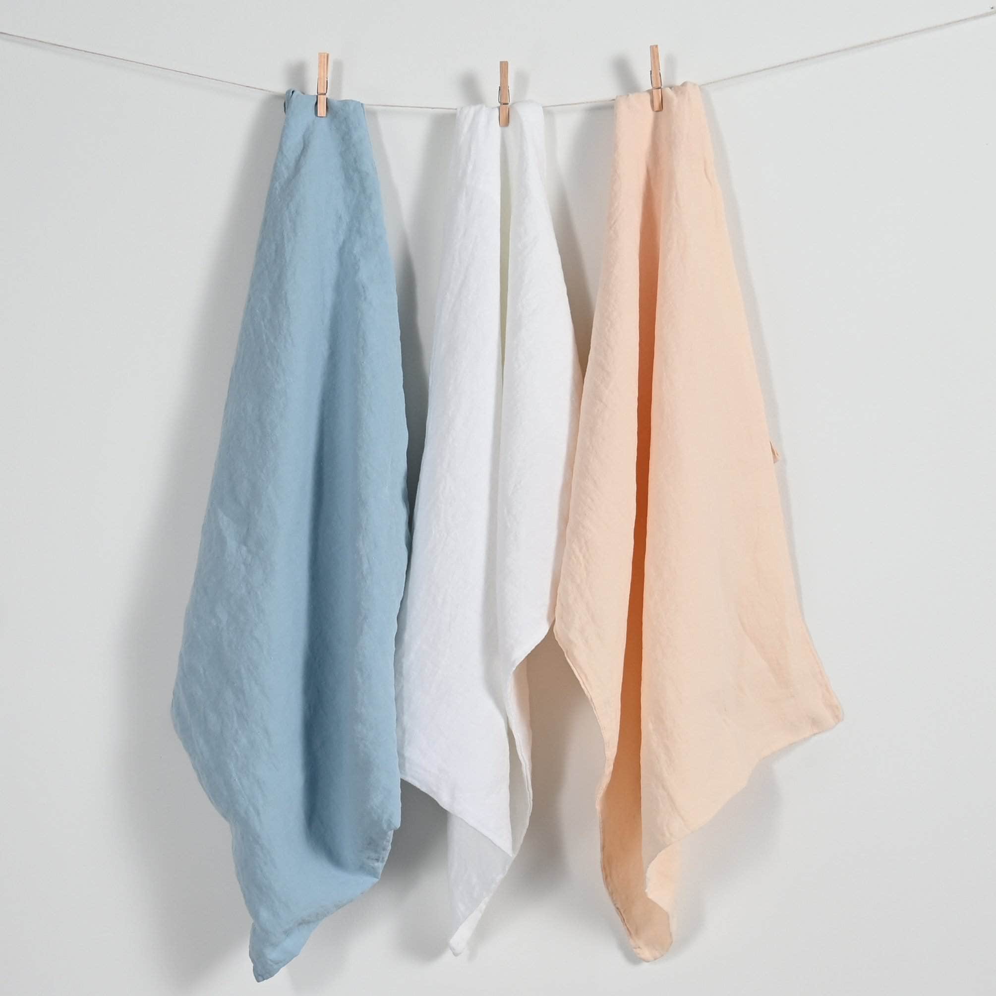 Hanging Linen Pillowcases in Blue Mist, White and Pearl