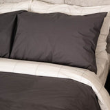 Close up of bed with Essential Collection Percale Sheet Set in Light Grey Frame