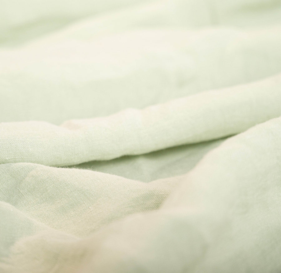 Close up of seafoam linen duvet cover