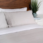 close up of white sheet set and pillow cases with Mushroom Duvet cover and 2 mushroom pillow cases