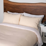 Bed with Pearl duvet cover and Pillowcases with White linen sheet set and pillowcases