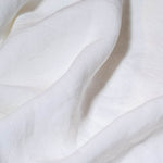 close up of white linen sheets 