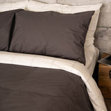 Bed featuring the Essential Collection Percale Pillowcases in Charcoal and in Light Grey Frame