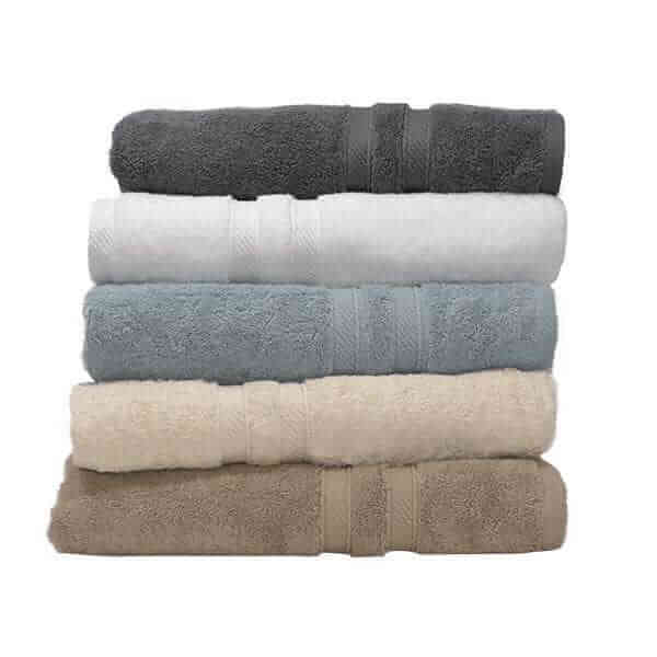 Dark Grey, White, Blue, Cream and Truffle coloured Element Turkish Bath Sheets stacked