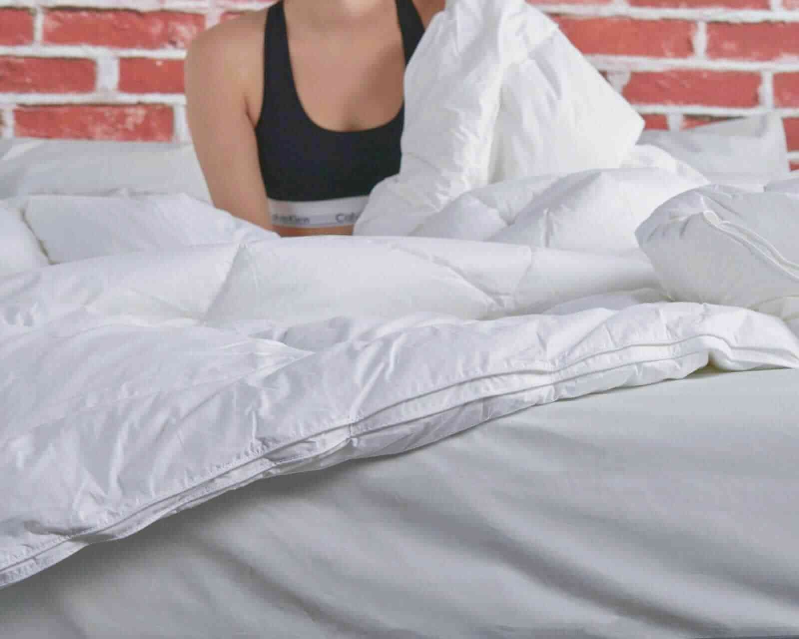 Woman in bed with Down Alternative Duvet Insert 